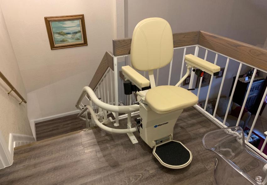 This image is of a Harmar Custom Curve Stair Lift installed in someone's home.